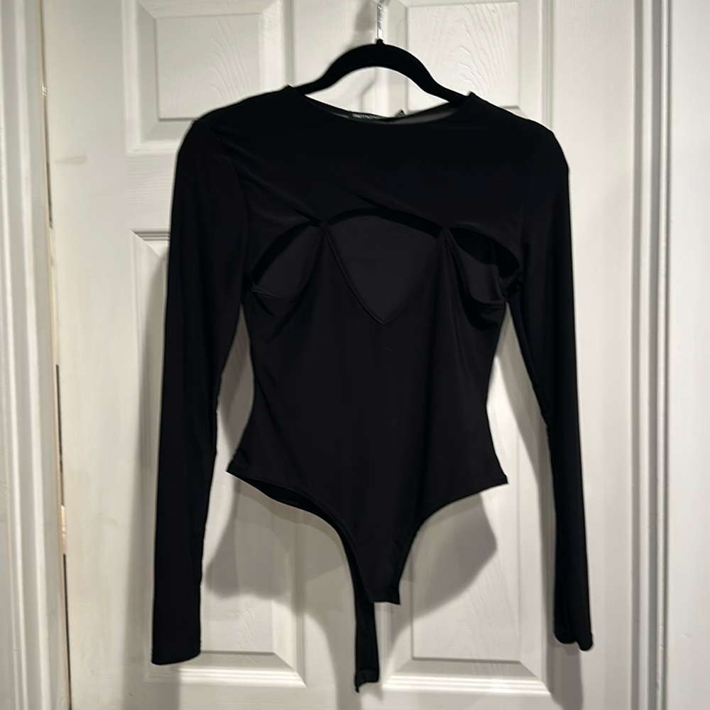 Pretty little thing body suit size us4